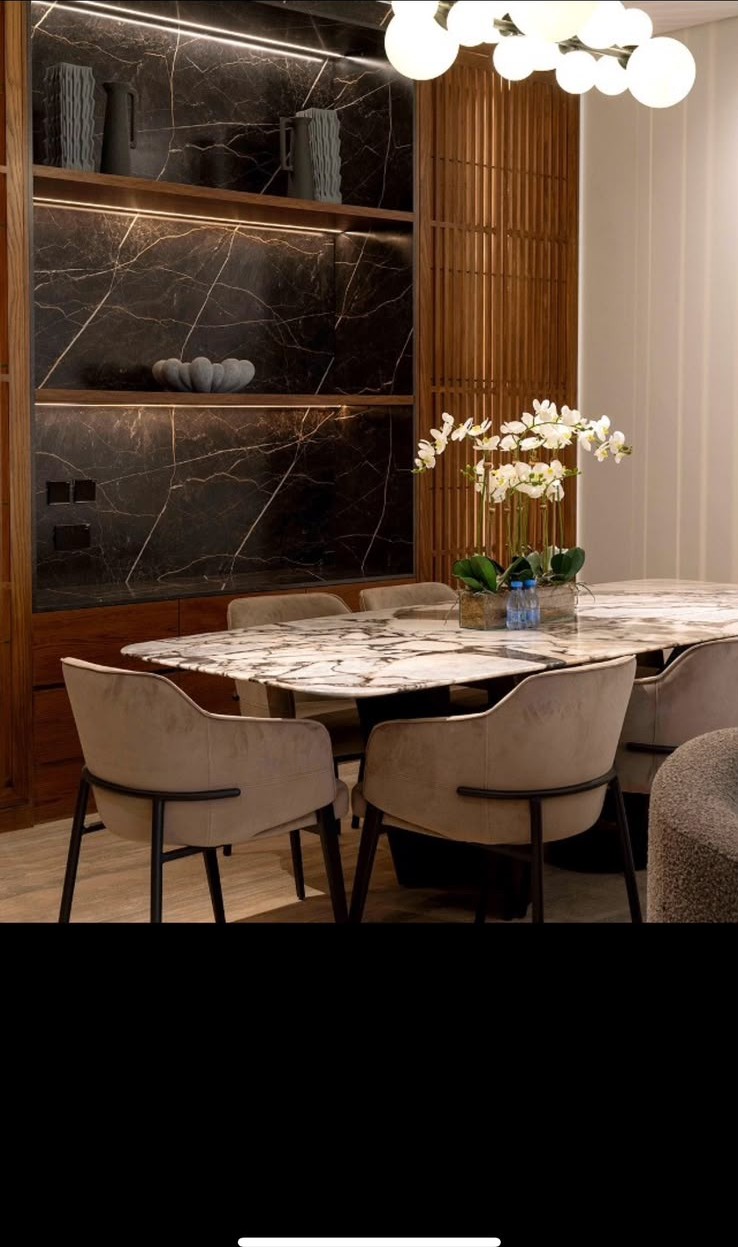 Azure villa dining area with marble table