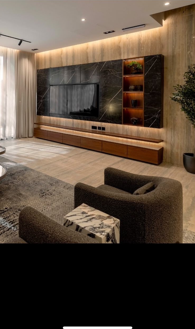 Azure villa living room with travertine feature wall