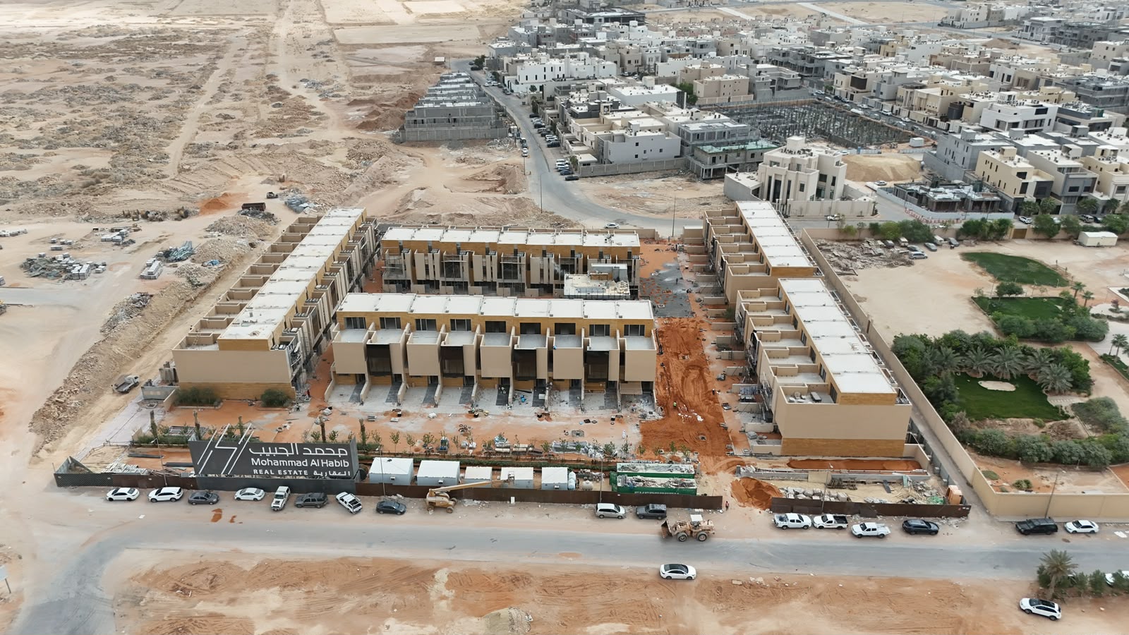 Mohammad Al Habib Real Estate compound aerial with project signage